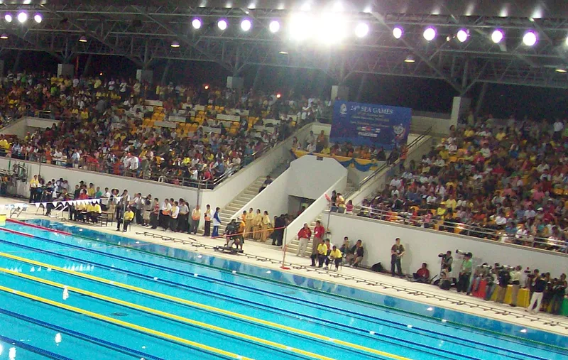 Historic competition pool and grandstands at the Korat aquatic centre.