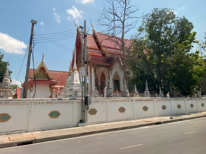 Wat Chaeng Nok temple wall and hall in Korat, photographed in 2025.