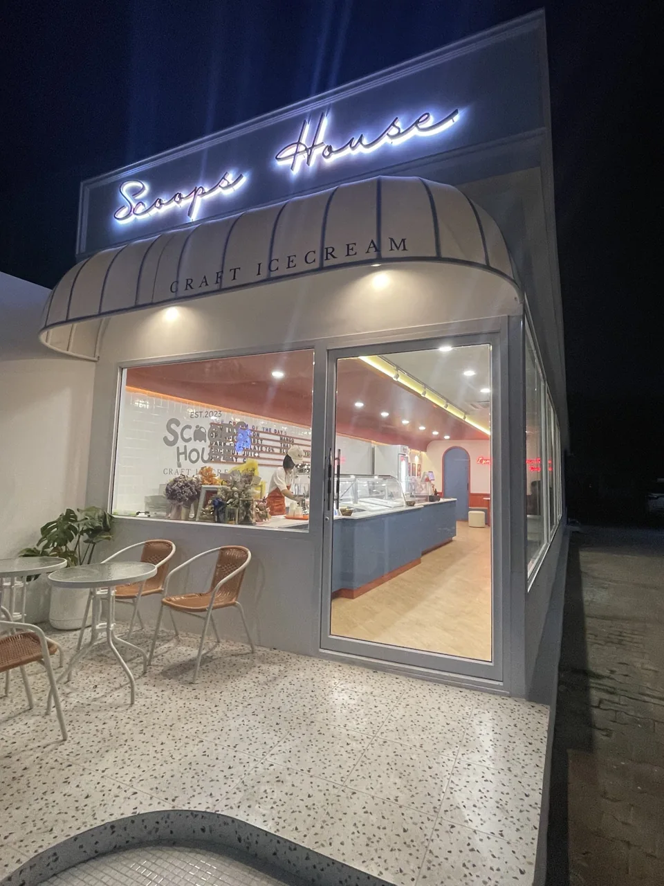 Scoops House storefront at night